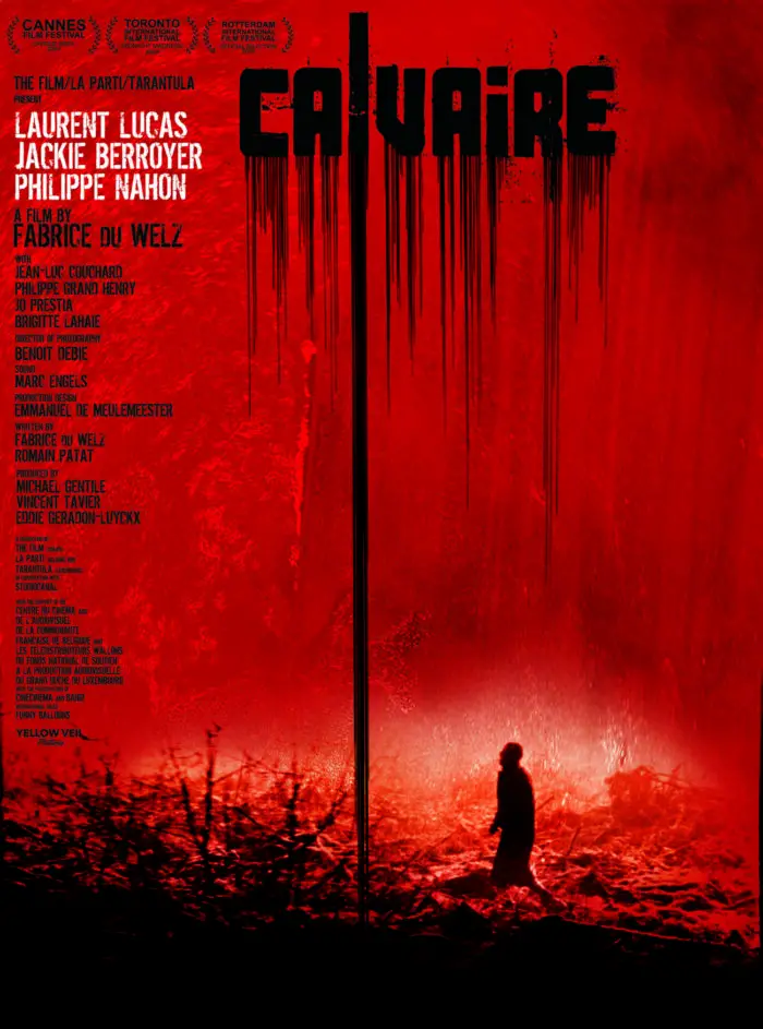 The poster for Calvaire is red with the letters of the title dripping like blood over a scene of a silhoutte walking through the woods.
