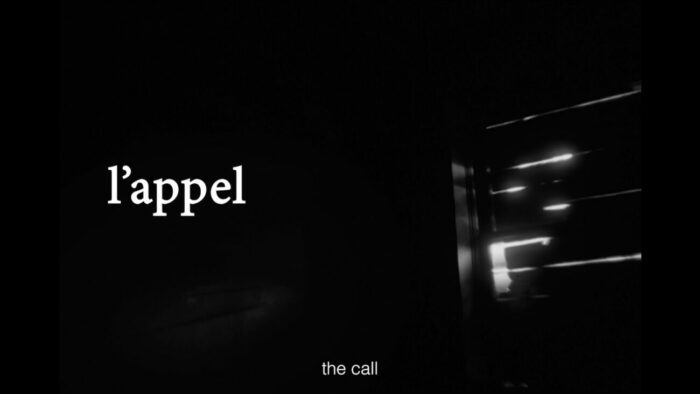 Title card for The Call, white text spells "L'appel" overlayed on a black and white image of sunshine shining through window shades