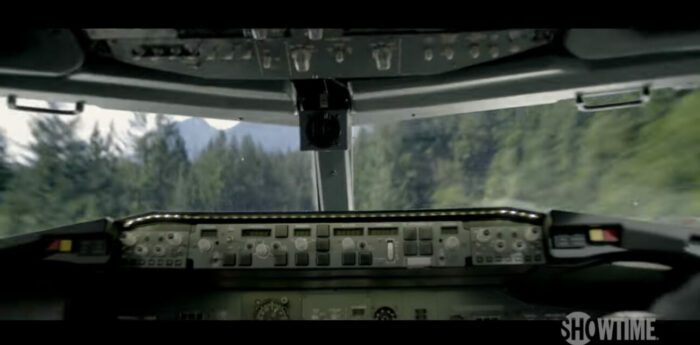 The front window of a plane as it crashes