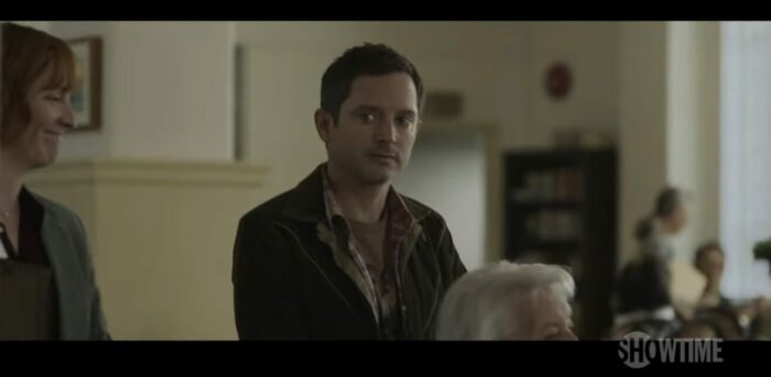Elijah Wood’s character stares at Misty