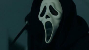 Ghostface holds a knife threateningly