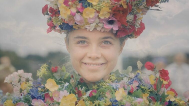 a woman smiling wearing a flower crown and a dress made of flowers. The remnants of flames can be seen in a transitional image to denote what she's viewing.