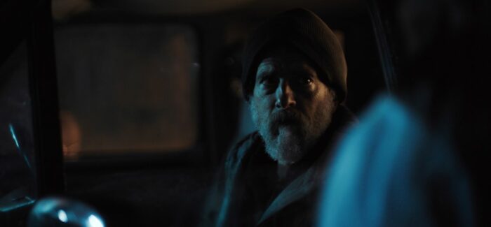 A man looking distressed