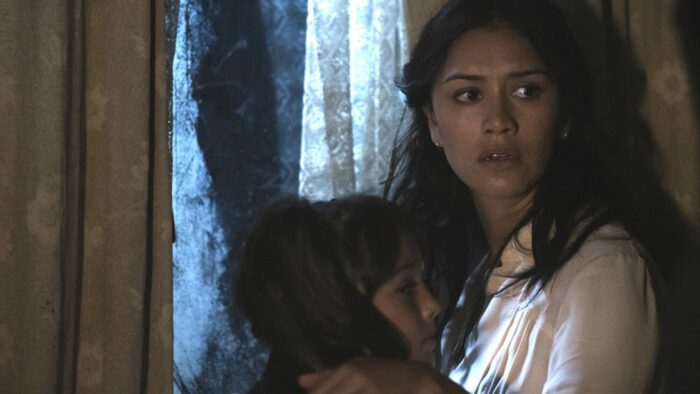 A scared woman and child
