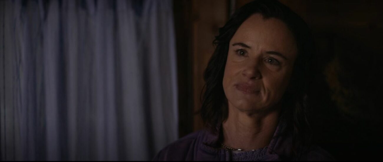Natalie with a painful, yet accepting look on her face