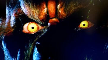 Close-up of glowing yellow werewolf eyes. Thomas Piccarillo as Dirk and the werewolf in Hard Rock Nightmare (1988). Screen capture off of Shudder.