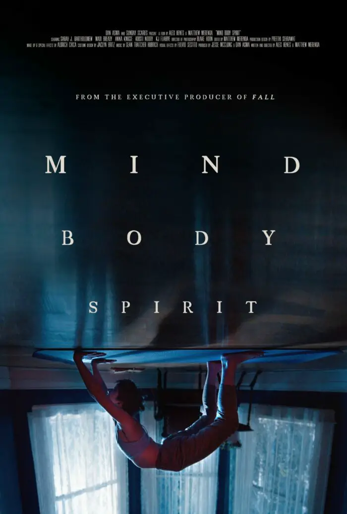 The Poster for Mind Body Spirit shows Anya bent over backward in front of a well framed trio of curved windows.
