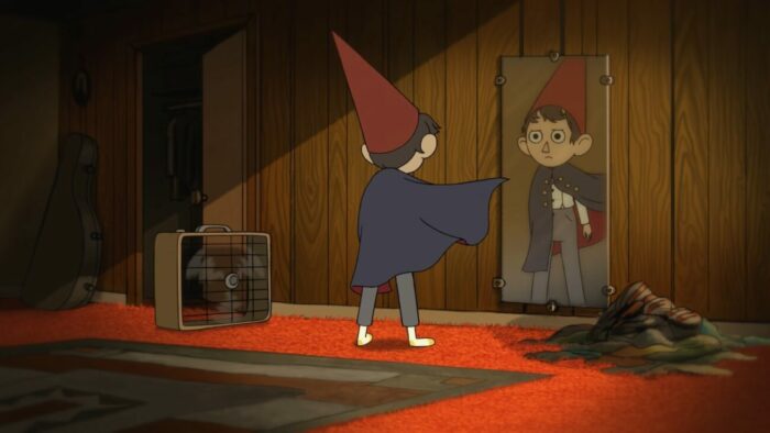 Wirt stands in front of a mirror wearing his Halloween outfit