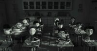 Kids sitting in a classroom