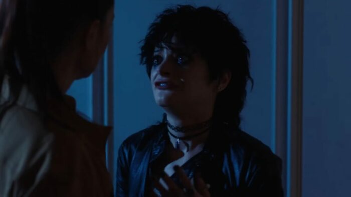 Cassandra tries to warn Lorna about the creature outside