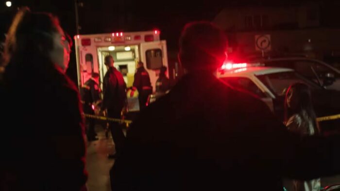 Richard walks towards April's crime scene