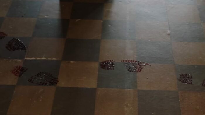 Bloody footsteps appear on the ground