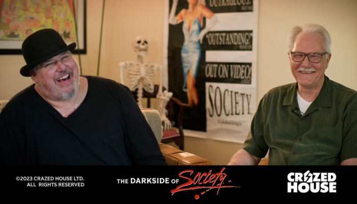 Zeph laughs while sitting next to Brian Yuzna