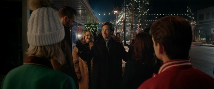 People outside on Christmas Eve