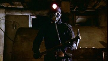 A medium shot of My Bloody Valentine's central killer (with pickaxe in tow).