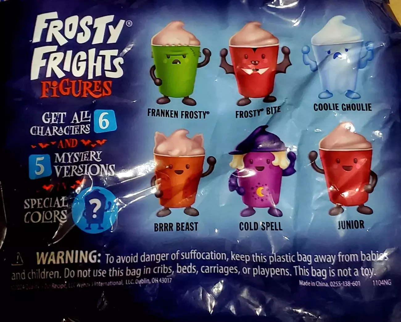 Promotional image of Wendy’s Frosty Frights Figures for the 2024 Halloween Kids Meal. Six collectible characters are shown: Franken Frosty, Frosty Bite, Coolie Ghoulie, Brrr Beast, Cold Spell, and Junior, with the promise of five mystery versions. Each character is styled in fun, spooky designs related to Halloween, with special colors teased as well.