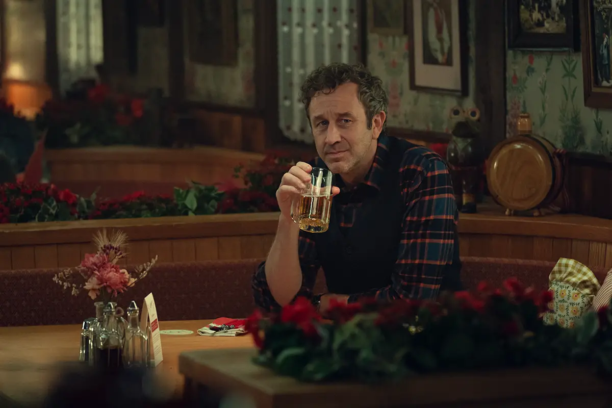 Mike holding a pint in The Juniper.